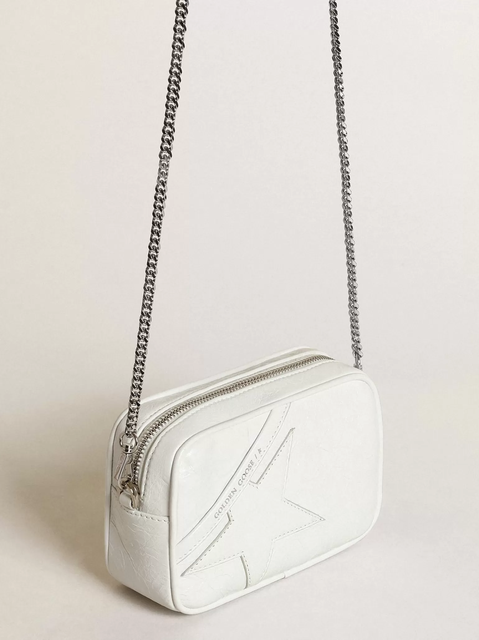 New Bolsa Mini Star feminina de couro brilhante branco com estrela tom sobre tom MULHER Minibolsas | Bolsas tiracolo