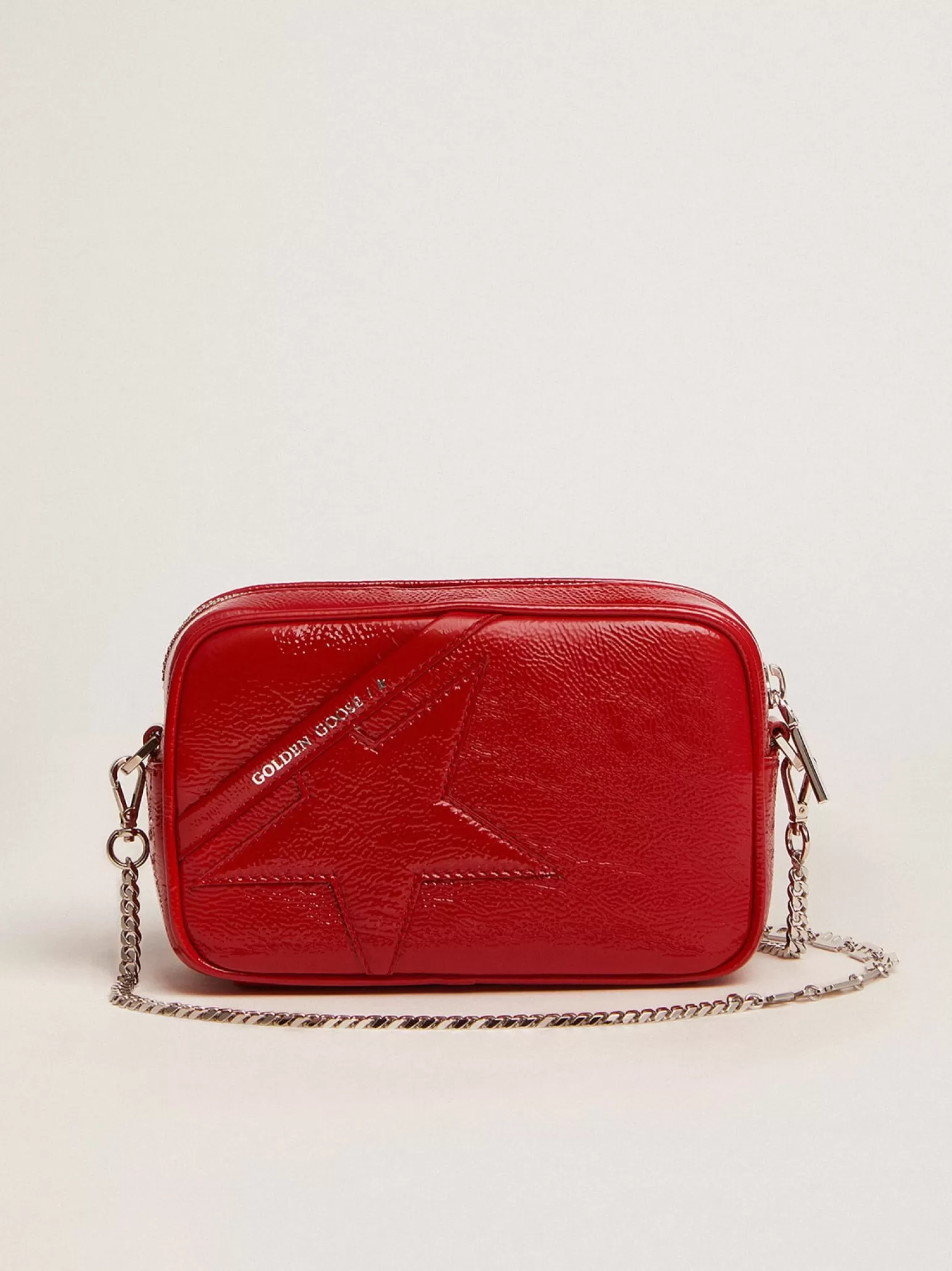 New Bolsa Mini Star feminina de couro pintado vermelho com estrela tom sobre tom MULHER Minibolsas | Bolsas tiracolo