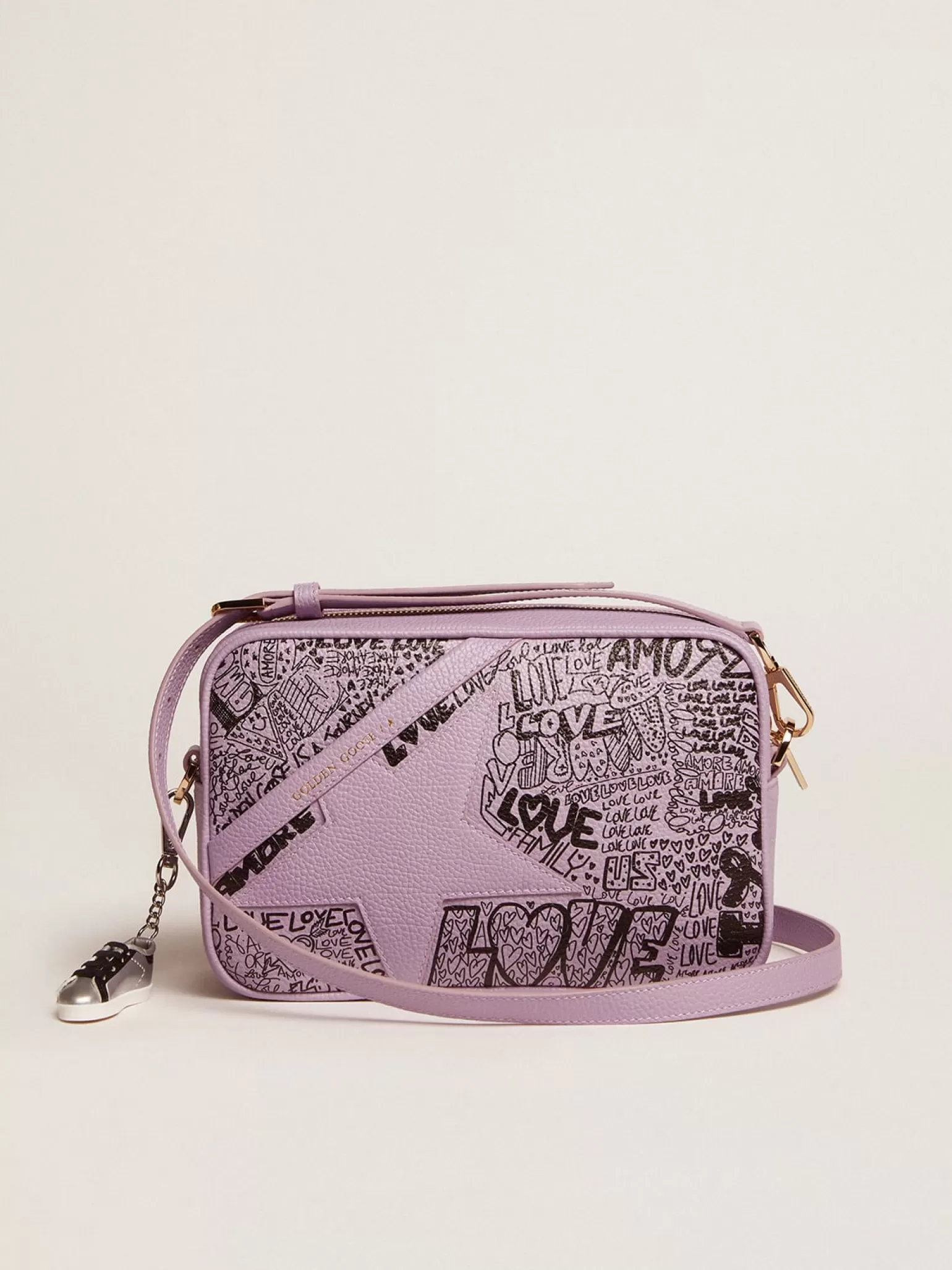 Clearance Bolsa Star de couro martelado lilás com estrela de couro tom sobre tom e estampa de grafite preto all-over MULHER Bolsas tiracolo