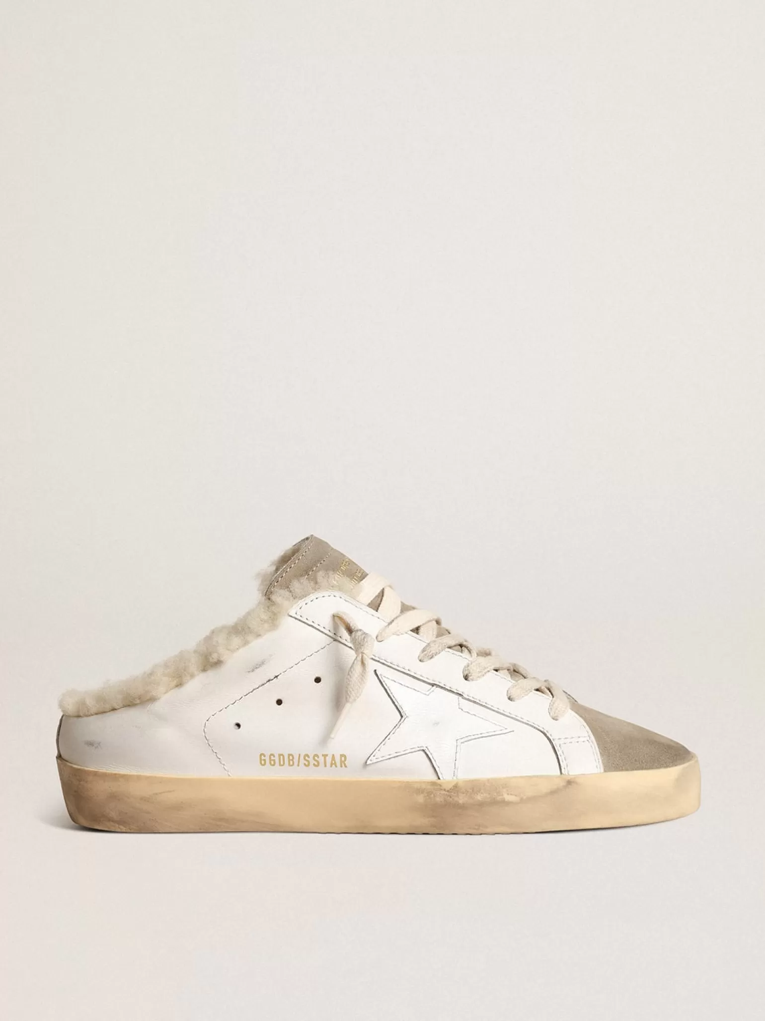 Store Mule Super-Star com estrela de couro branco e forro de shearling MULHER Super-Star Sabot