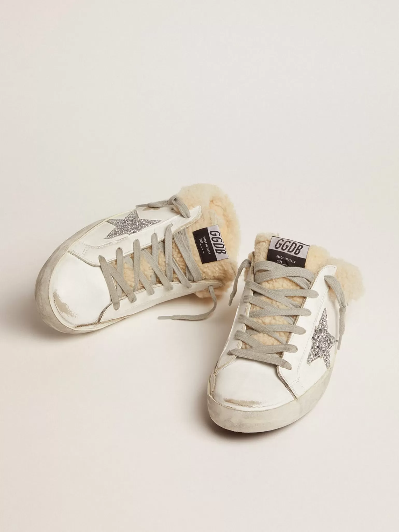 Store Mule Super-Star feminino de couro branco e forro de shearling MULHER Super-Star Sabot