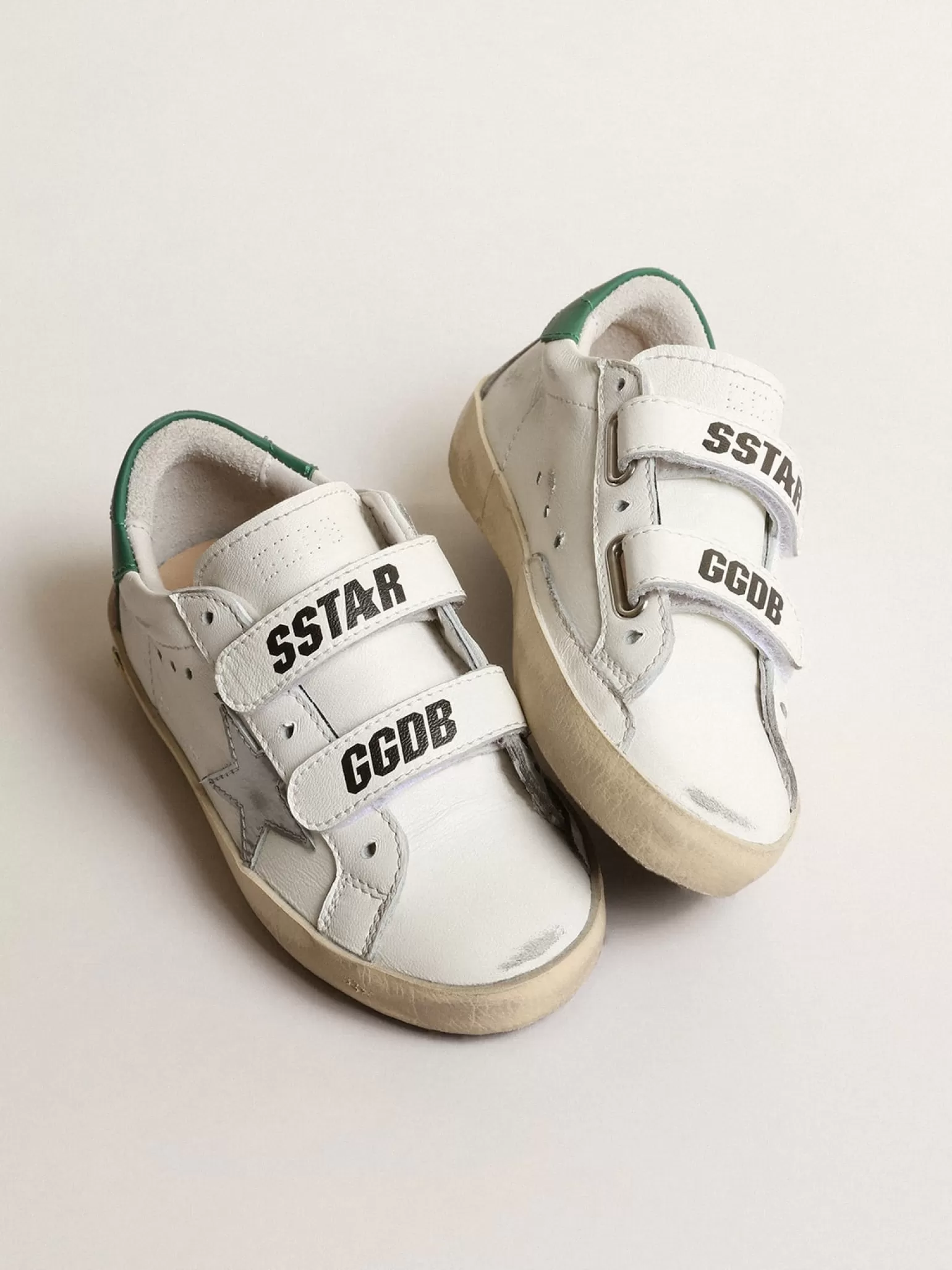 Shop Old School Junior com estrela de couro metálico e talão verde Meninas pequenas (1-3 anos) | Meninos pequenos (1-3 anos)