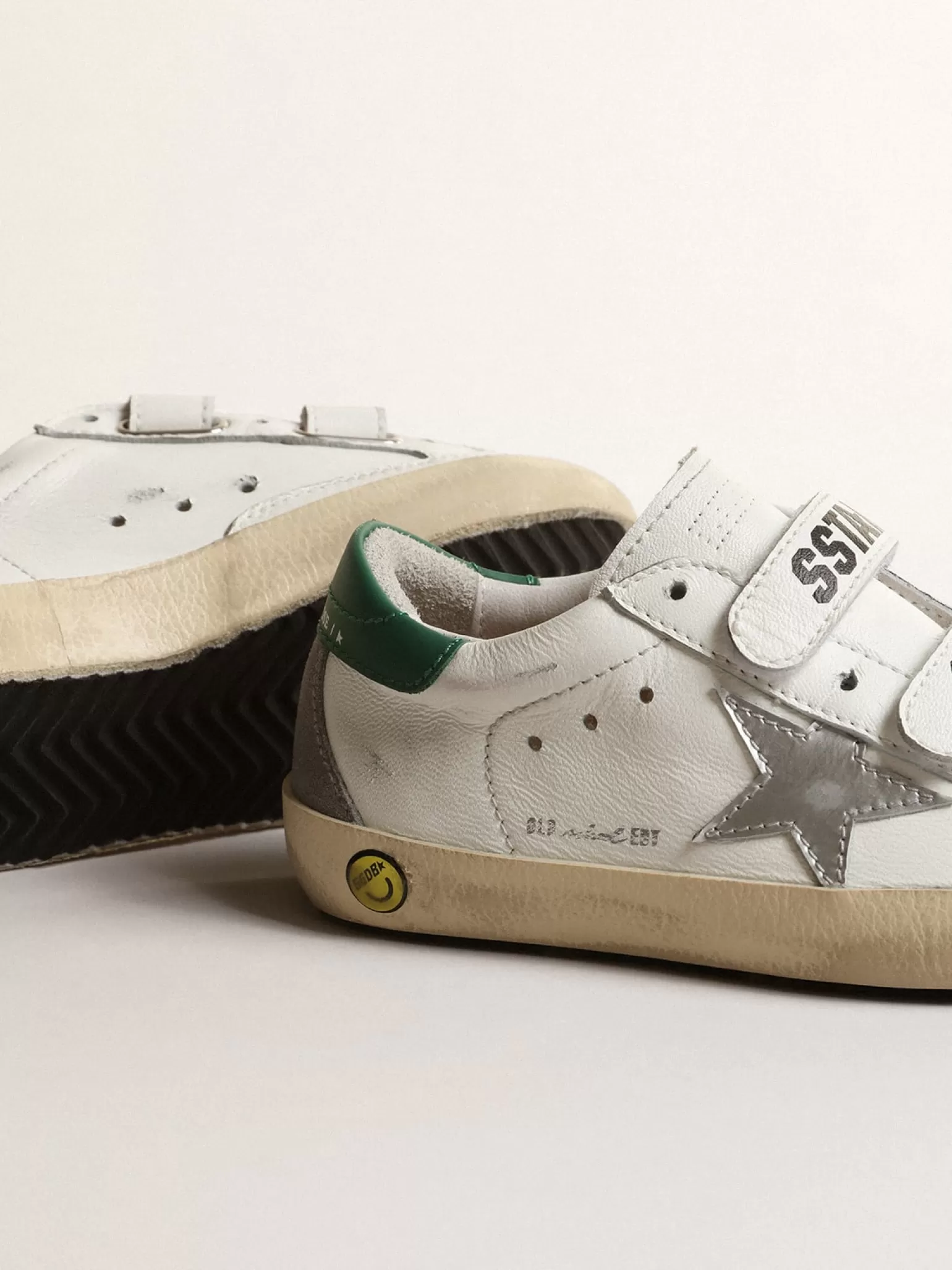 Shop Old School Junior com estrela de couro metálico e talão verde Meninas pequenas (1-3 anos) | Meninos pequenos (1-3 anos)