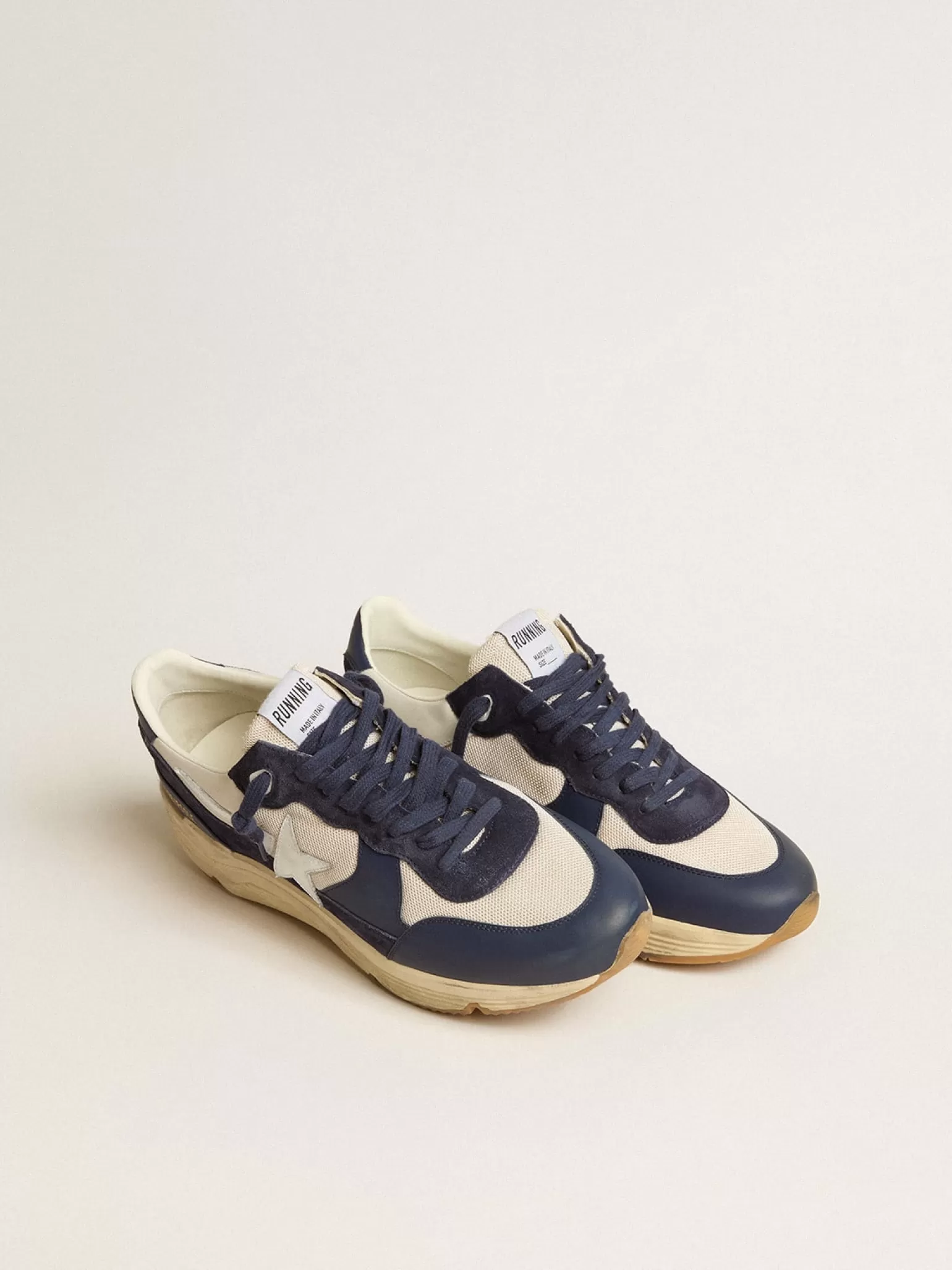 Flash Sale Running Sole de tela creme e couro azul com estrela de couro branca Running Sole