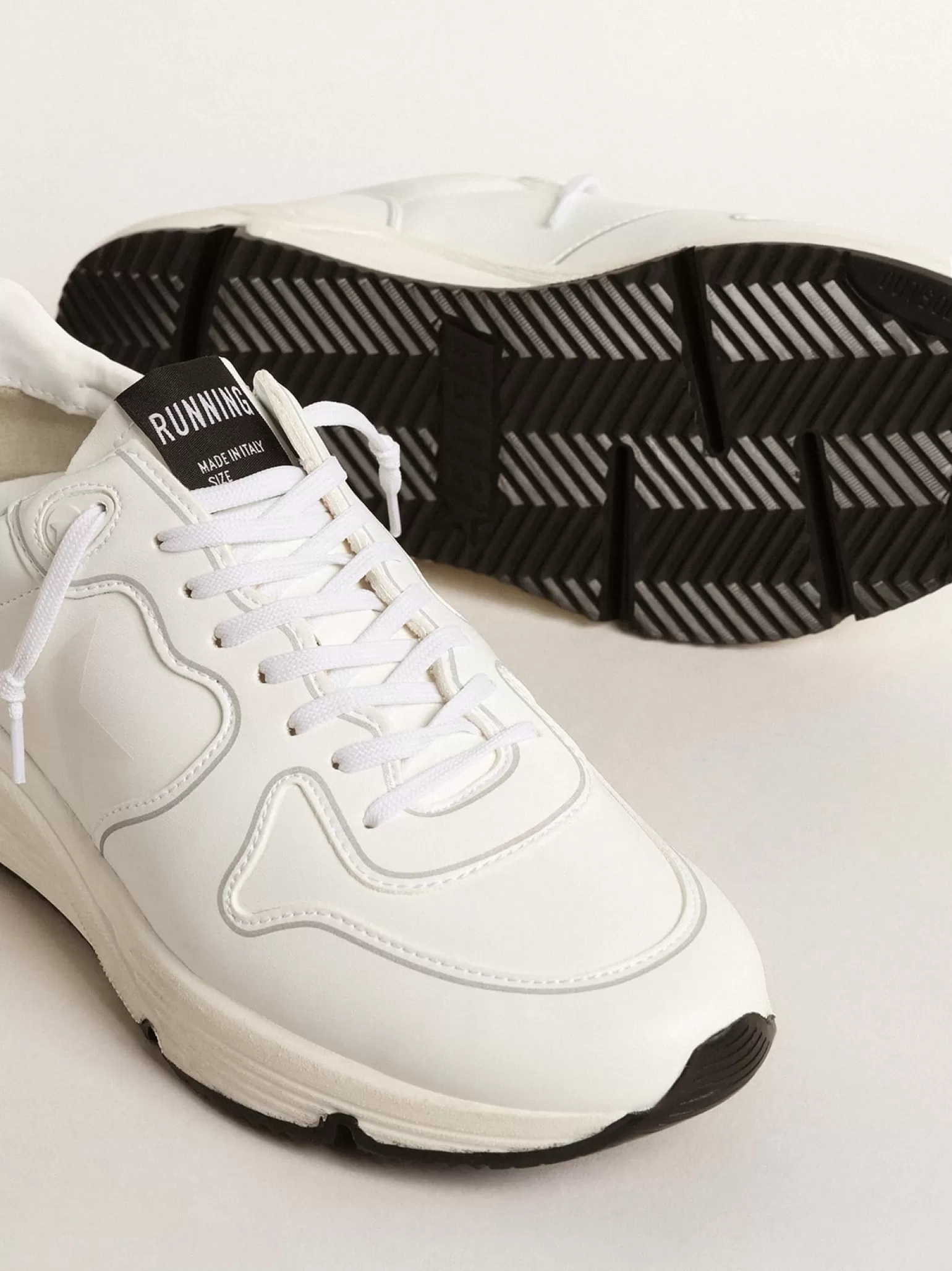 Store Running Sole Masculino com base vegetal e estrela e talão brancos Running Sole