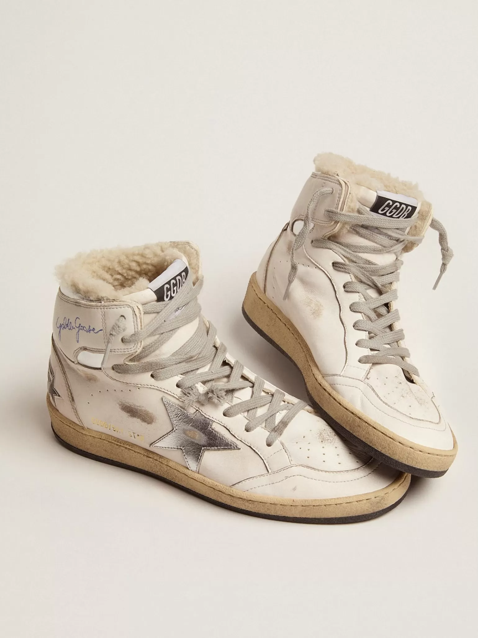 Store Tênis Sky-Star feminino com assinatura no tornozelo e forro de shearling MULHER Sky-Star